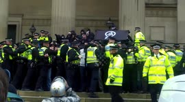 Officer gets knocked down as police kettle Nazi protest in Liverpool