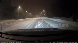 Near crash in snowy roundabout