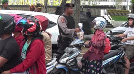 riders kissing police hands