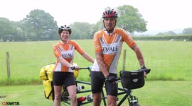 Middle-aged couple travel 11,500 miles around the world on a tandem bike