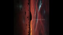 The sunrise is so red in victor harbor skies it looks like fire