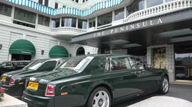 The Peninsula Hotel,  Hong Kong with Rolls Royce cars