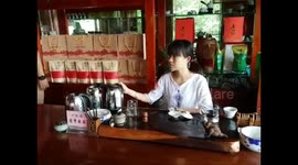 Peeing clay boy temperature gauge in Chinese tea house