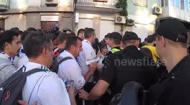 football Fans in line for police inspection in front of the football match Real Liverpool near the Olympic Stadium in Kiev before the start of the Champions League final in Kiev, Ukraine.