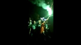 Outside the cafe, Real Madrid fans celebrating the win at the final whistle