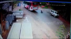 Lucky escape for scooter rider in bus smash