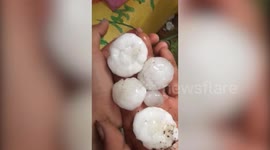 Golf ball-sized hailstones hit eastern China