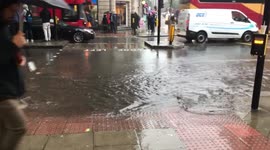 The rain flooding London town