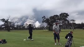 Golfers undistracted by Hawaii volcano’s massive ash plume behind them