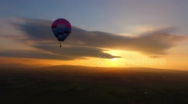 Drone Captures Hot Air Balloon Against Setting Sun!