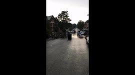 Flooded road in Birmingham during thunderstorms