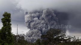 Hawaii's Kilauea volcano billows giant plumes of smoke and ash