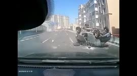 Minivan rear-ended and rolls over on highway