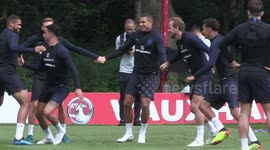 Dele Alli and Kyle Walker wrestle during training warm-up Kabaddi match