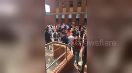 Newsflare Edit - Tommy Robinson protesters chant loudly outside Leeds Crown Court