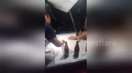 Filipino villagers amazed when they see hail stones for the first time