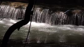 Sunlight dancing on a waterfall.