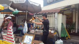 The art of making Thai tea in Thailand.
