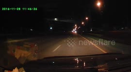 Driver amazed when meteor lights up night sky