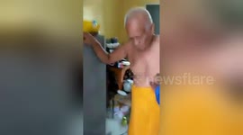 Elderly Buddhist monk caught romping with woman