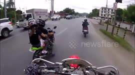 Motorbike rider reprimands couple for carrying daughter on bike
