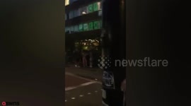 Revellers use two traffic lights to build makeshift HAMMOCK