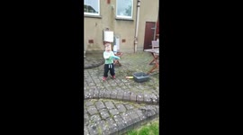 Little boy soaks his daddy and thinks it's hilarious!