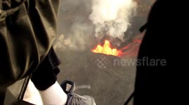 Terrifying lava fountain in Hawaii's Kilauea captured from doors-off helicopter