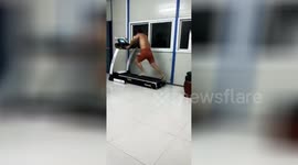 Drunk husband tumbles down moving treadmill