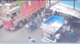 Hero cop saves man from certain death after truck knocks him down