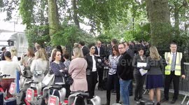 Staff and guests evacuate the Corinthia Hotel London after the fire alarm went off by Jim Connor