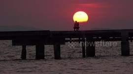 Photographer at sunset.