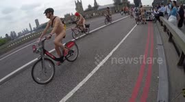 Saddle sore? Cyclists ditch lycra to pedal across Westminster Bridge for World Naked Bike Ride