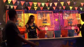 Screaming girls make a splash in Thailand and raise money for charity.