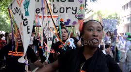 Women and girls march in London's mass participation artwork PROCESSIONS