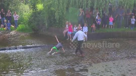 Young Boy Falls In Water