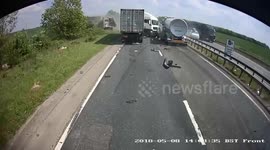 Shocking moment tanker ploughs into back of HGV on UK A-road