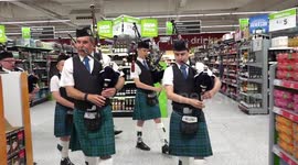 Newtonhill Pipe Band surprise shoppers in Asda Portlethen with flashmob walk through supermarket