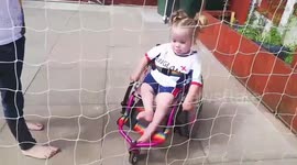 Girl, 3, in England shirt inspires others by playing football in wheelchair