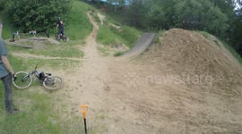 Man falls on his bike doing a trick