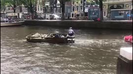 Vintage Amphicars spotted in Amsterdam Canal