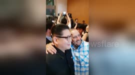 CORRECT VERSION: Kim Jong Un imposter poses with
