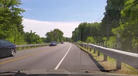 Dashcam captures near collision with pickup truck