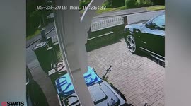 CCTV captures brazen thieves stealing a child's mountain bike from a driveway in broad daylight