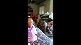 Baby laughing at feet