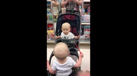 Baby discovers mirror