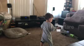 Toddler talking on charger