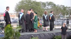 Newsflare Edit - Graduate nonchalantly performs backflip after receiving diploma