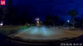 The man was lucky to fall in front of the car