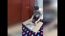 How to fold T-shirts with a cardboard box